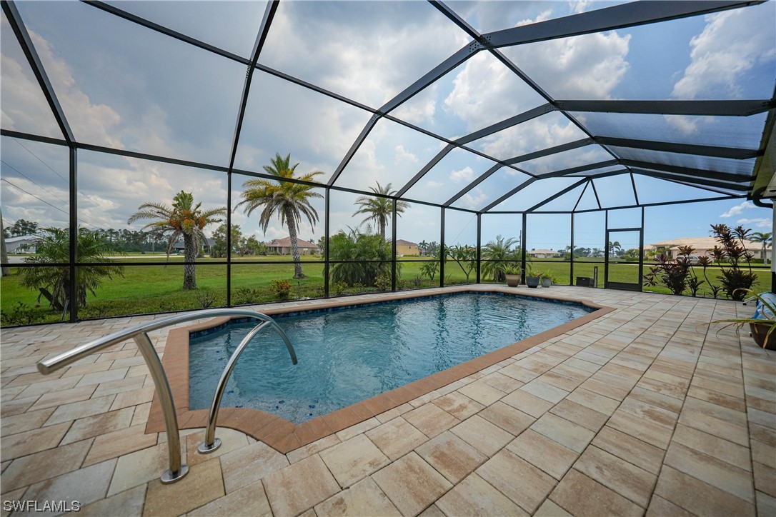 24501 Cabana Road Punta Gorda, FL 33955 - Photo 15 of 39 a view of a swimming pool with a porch