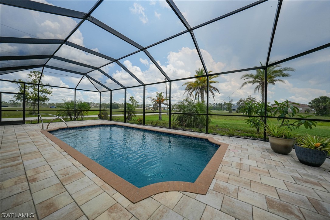 24501 Cabana Road Punta Gorda, FL 33955 - Photo 17 of 39 a view of swimming pool with a patio