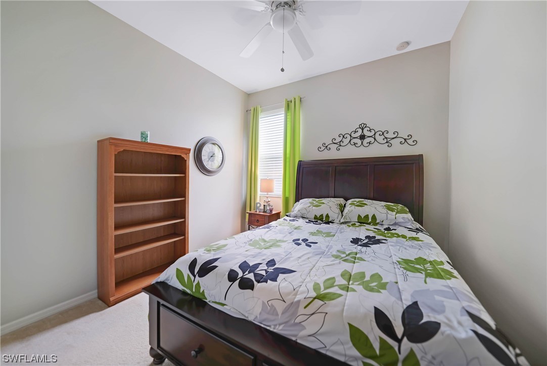 24501 Cabana Road Punta Gorda, FL 33955 - Photo 26 of 39 a bedroom with a bed and a window
