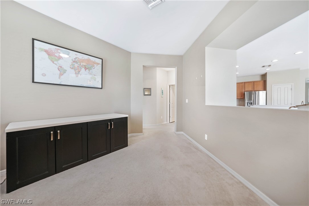 24501 Cabana Road Punta Gorda, FL 33955 - Photo 32 of 39 a spacious bathroom with a double vanity sink and a mirror