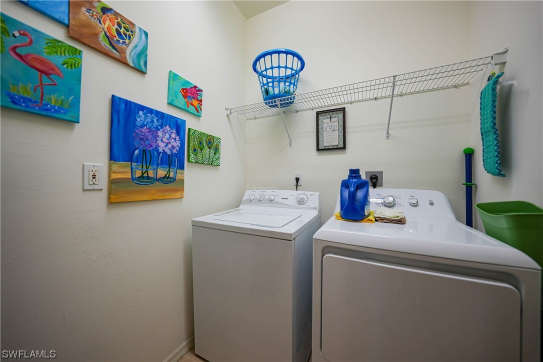 24501 Cabana Road Punta Gorda, FL 33955 - Photo 33 of 39 a utility room with dryer and washer