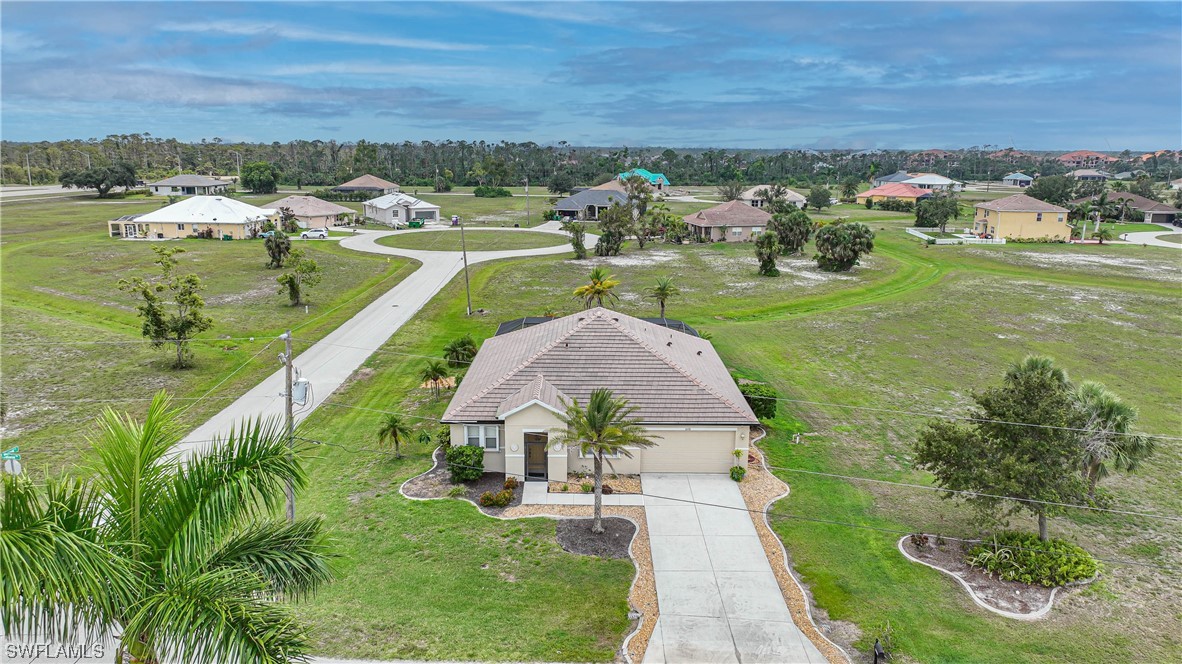 24501 Cabana Road Punta Gorda, FL 33955 - Photo 34 of 39 an aerial view of a house with outdoor space swimming pool and lake view