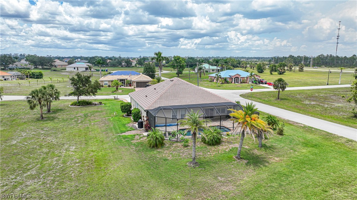 24501 Cabana Road Punta Gorda, FL 33955 - Photo 38 of 39 a view of a garden with houses