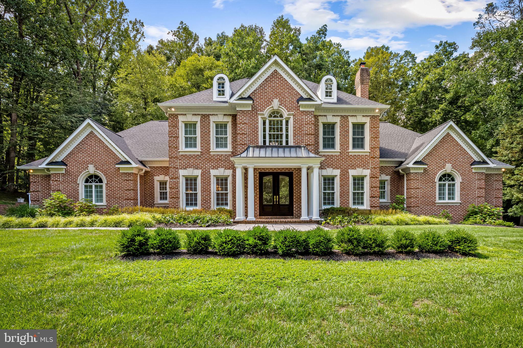 2214 Blue Mt Road Monkton, MD 21111 - Photo 1 of 68 a front view of a house with a yard and trees