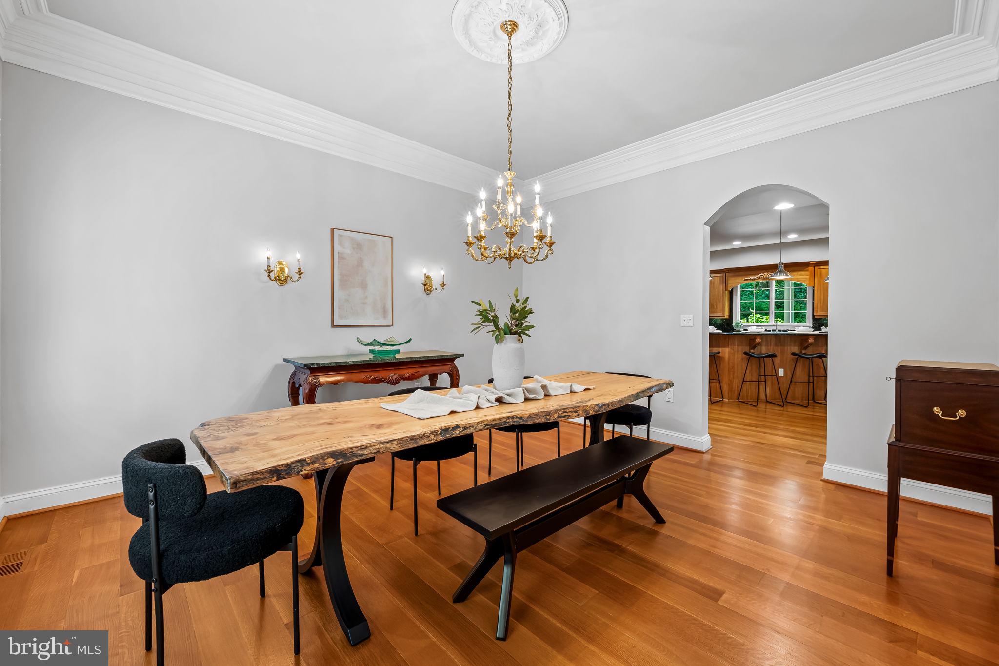 2214 Blue Mt Road Monkton, MD 21111 - Photo 12 of 68 a view of a dining room with furniture and chandelier