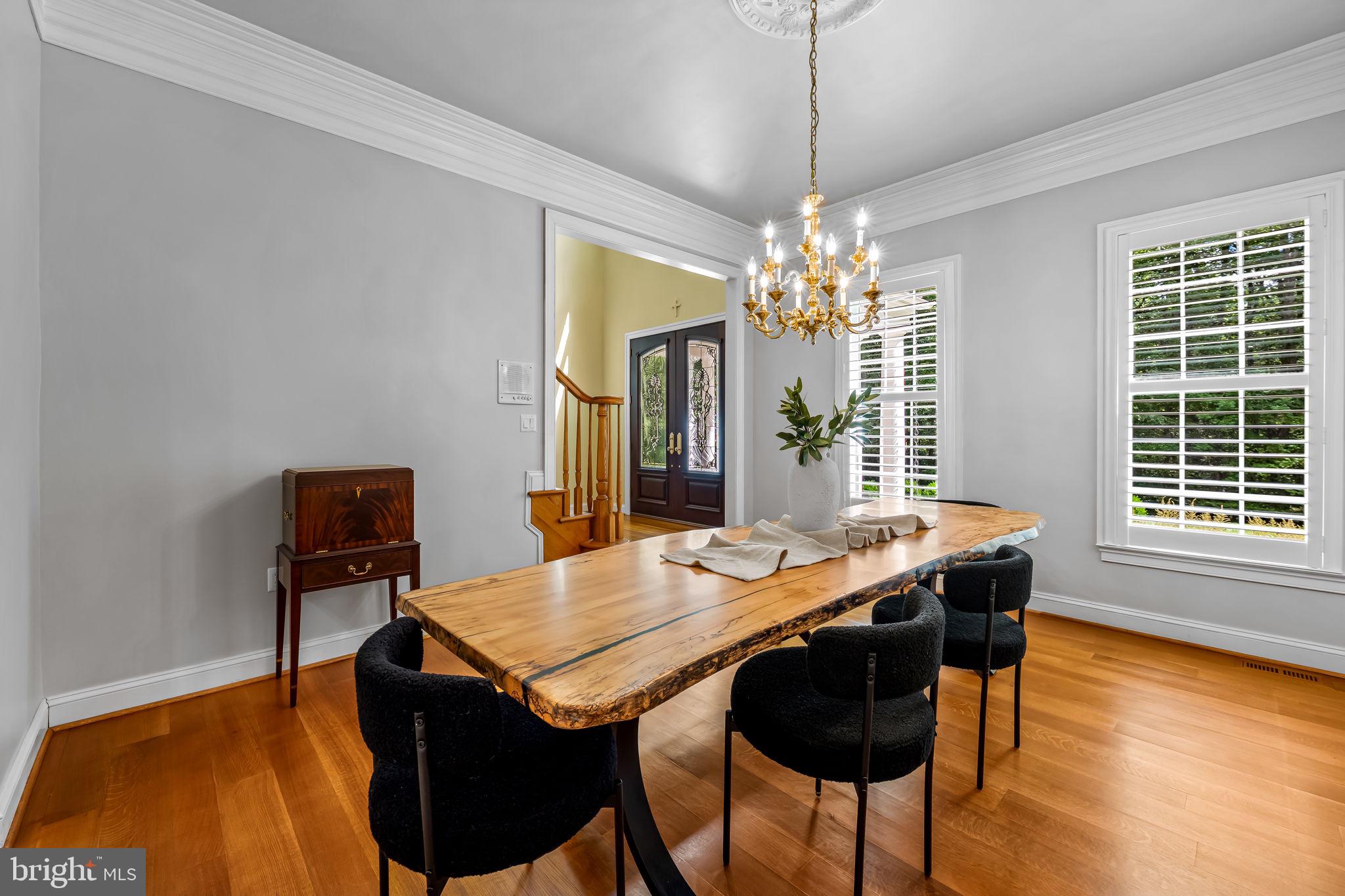 2214 Blue Mt Road Monkton, MD 21111 - Photo 13 of 68 a view of a dining room with furniture and wooden floor
