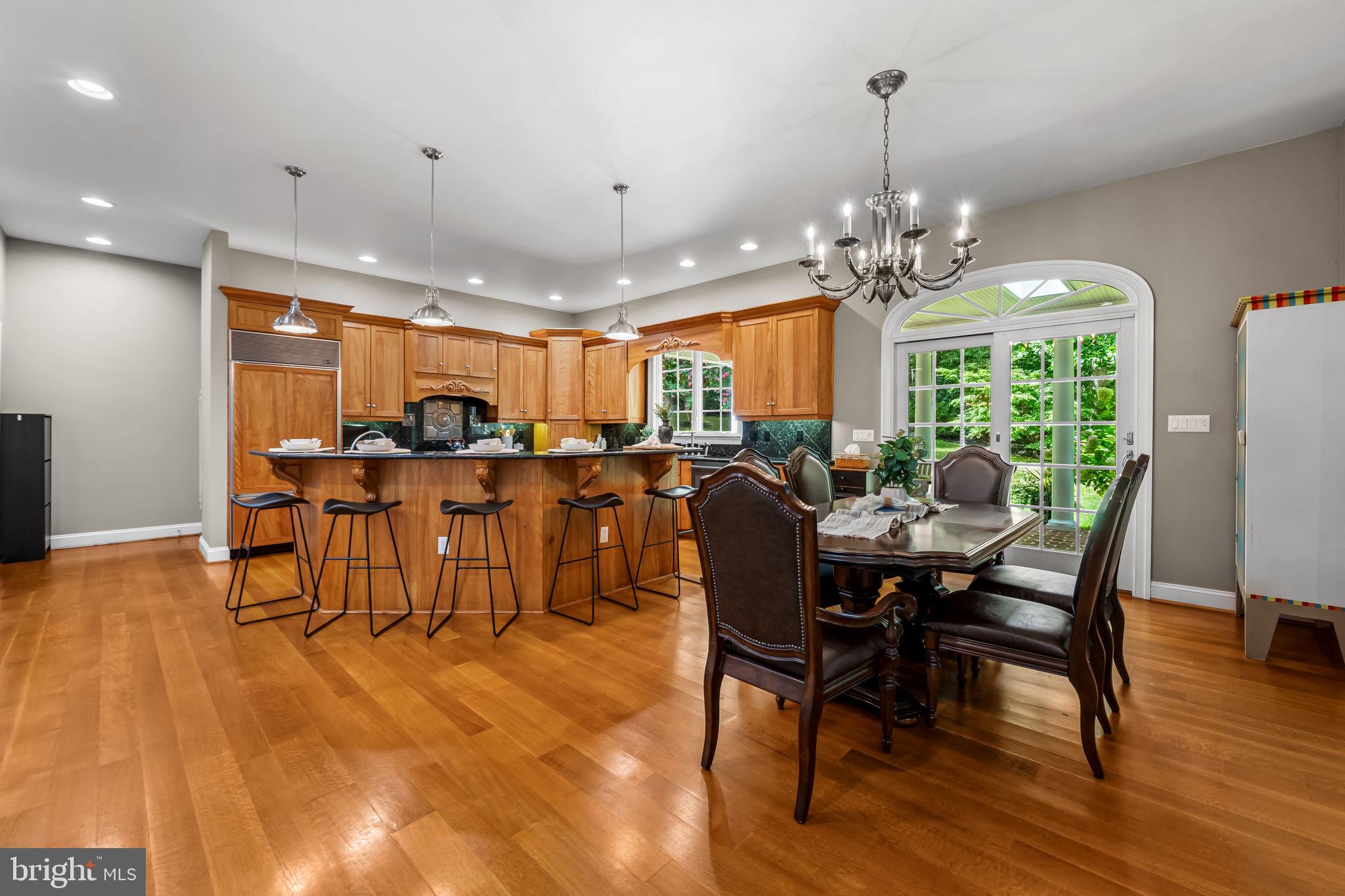 2214 Blue Mt Road Monkton, MD 21111 - Photo 15 of 68 a view of a dining room with furniture window and wooden floor
