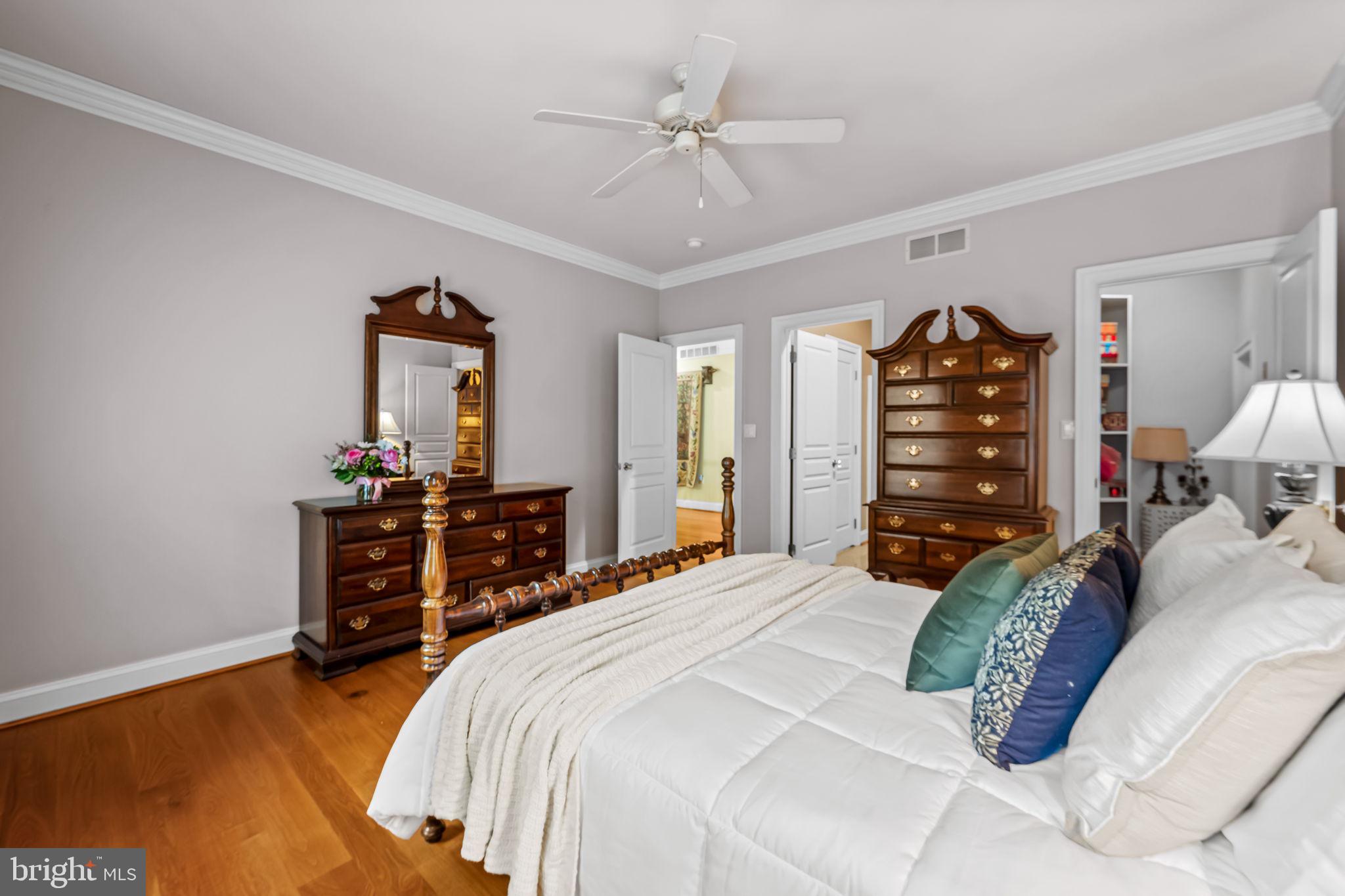 2214 Blue Mt Road Monkton, MD 21111 - Photo 39 of 68 a bedroom with a bed and a chandelier