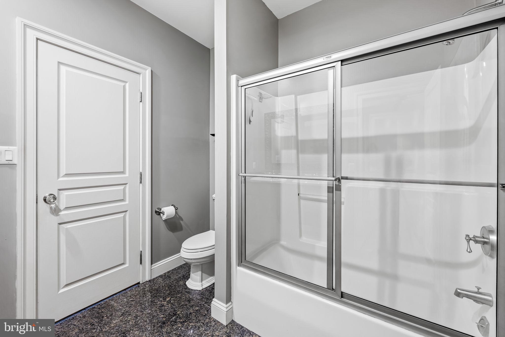 2214 Blue Mt Road Monkton, MD 21111 - Photo 46 of 68 a bathroom with a glass shower door