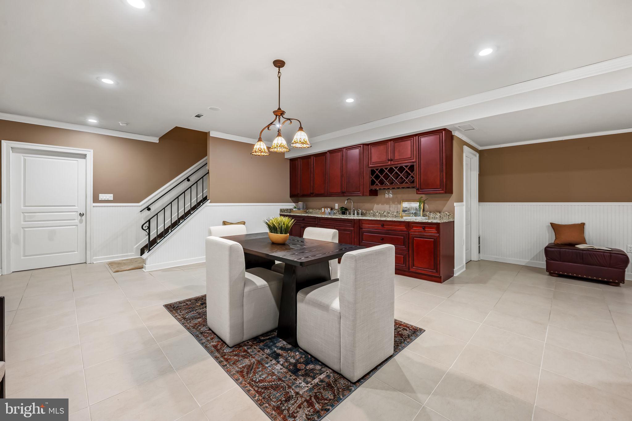 2214 Blue Mt Road Monkton, MD 21111 - Photo 52 of 68 a living room with furniture and a chandelier