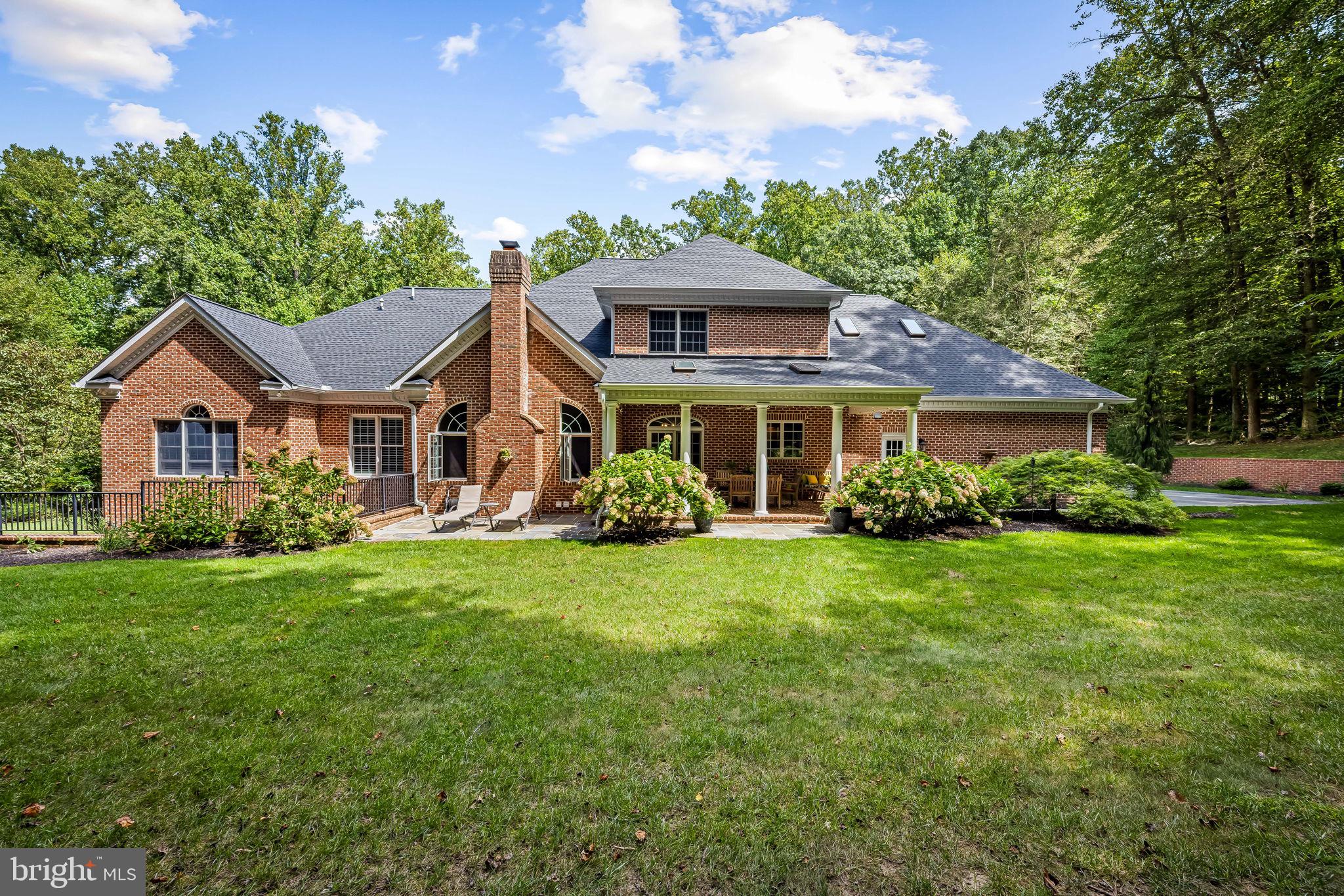 2214 Blue Mt Road Monkton, MD 21111 - Photo 64 of 68 a front view of a house with a garden