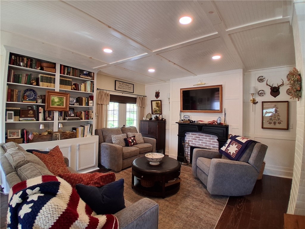 11683 County Route 119 Addison, NY 14801 - Photo 6 of 37 Livingroom with fireplace and built in shelving