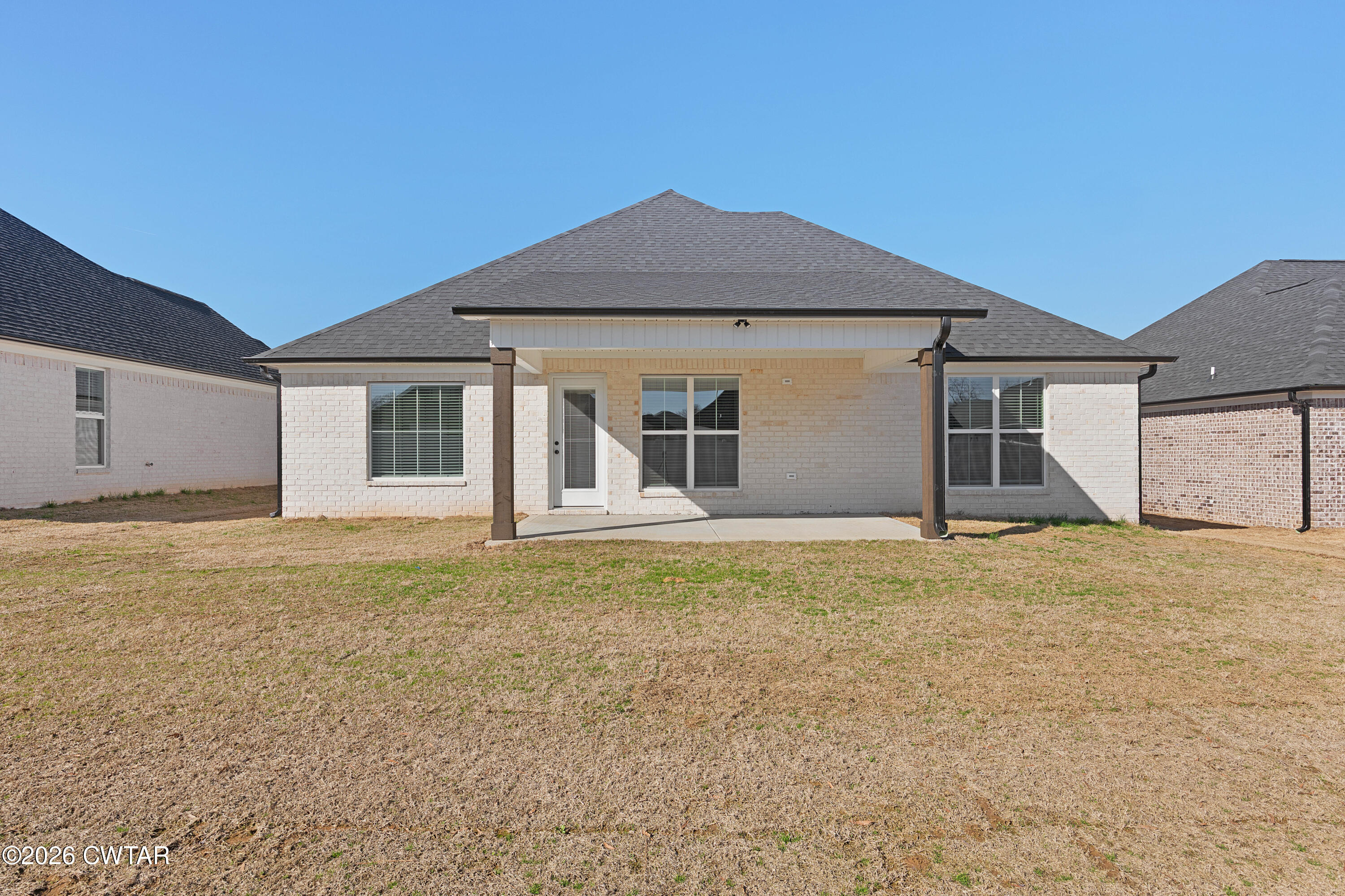 36 Easington Cove Jackson, TN 38305 - Photo 15 of 16 a front view of a house with a garden