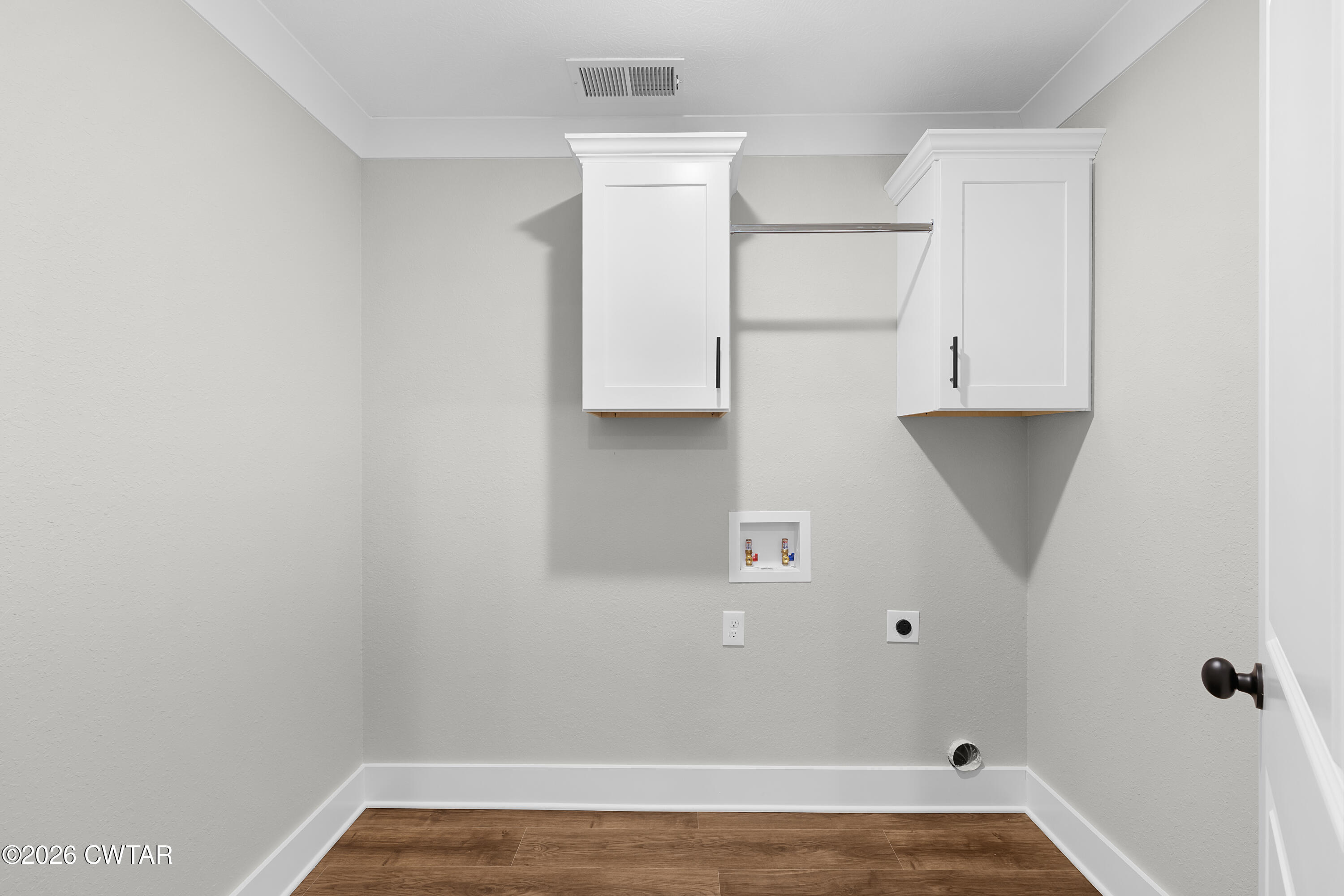 36 Easington Cove Jackson, TN 38305 - Photo 9 of 16 a view of a room with wooden floor and cabinets