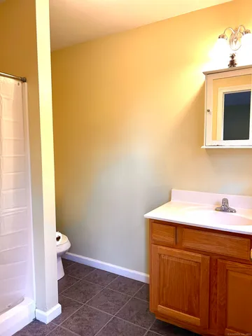 a view of a balcony with a tree