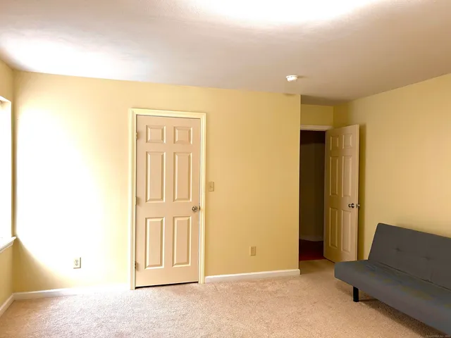 a kitchen with stainless steel appliances granite countertop a refrigerator a stove and a sink