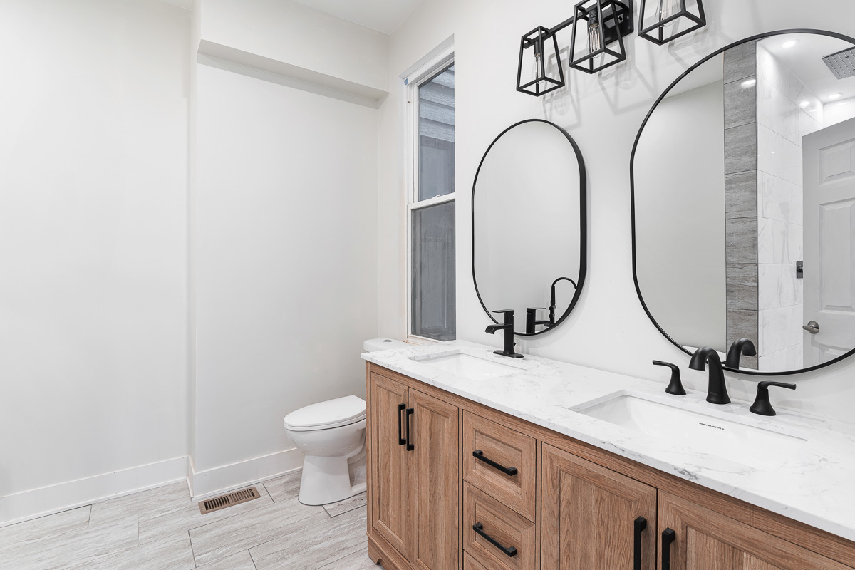 3003 West Fulton Street, Unit 1 Chicago, IL 60612 - Photo 15 of 29 a bathroom with a sink and a mirror