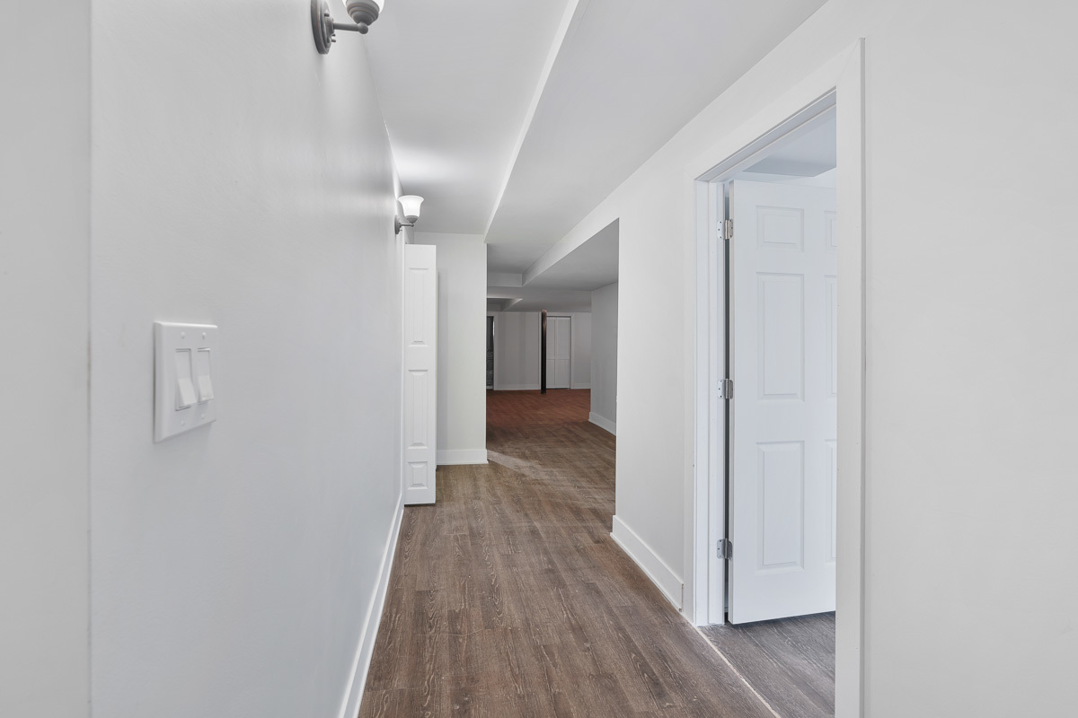 3003 West Fulton Street, Unit 1 Chicago, IL 60612 - Photo 22 of 29 a view of a hallway with wooden floor