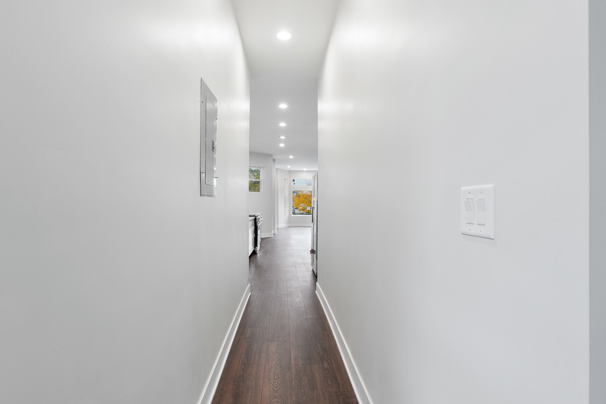 3003 West Fulton Street, Unit 1 Chicago, IL 60612 - Photo 9 of 29 a view of a hallway with wooden floor