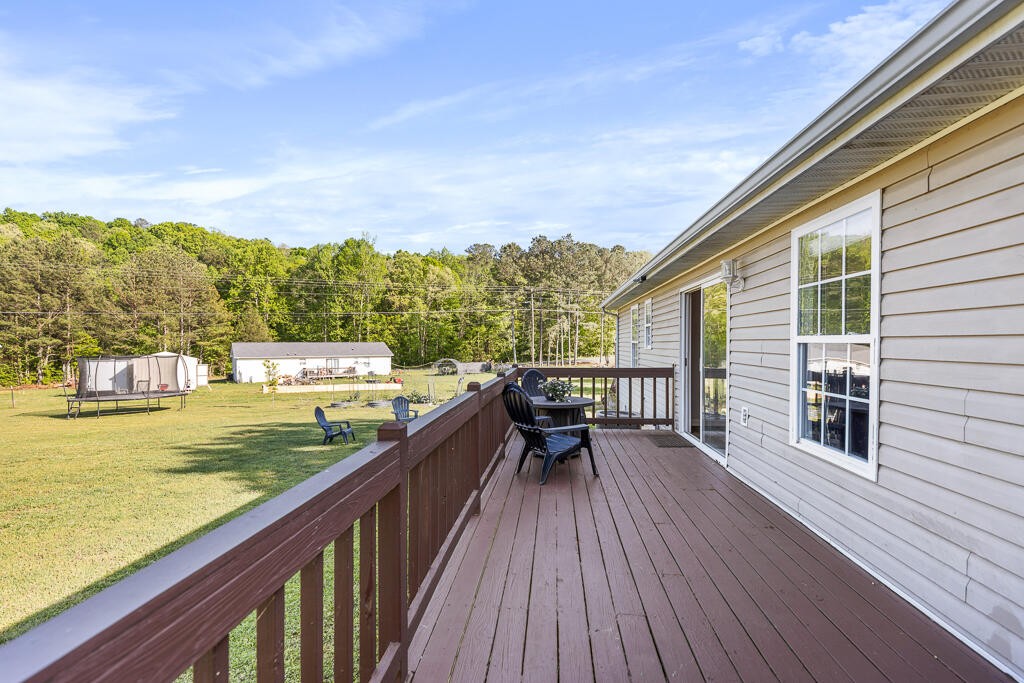 2850 Lower River Road Northwest Georgetown, TN 37336 - Photo 21 of 38 a view of a balcony with mountain view and wooden floor