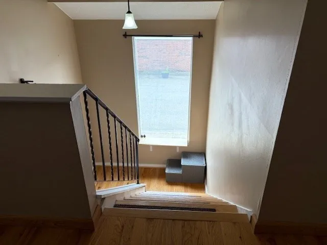 a view of entryway with wooden floor