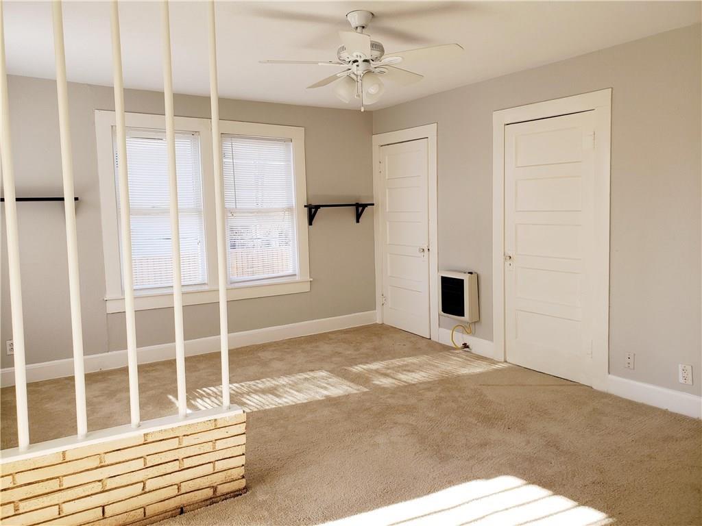 402 North Augusta Street Dallas, TX 75214 - Photo 3 of 11 a view of an empty room with a window