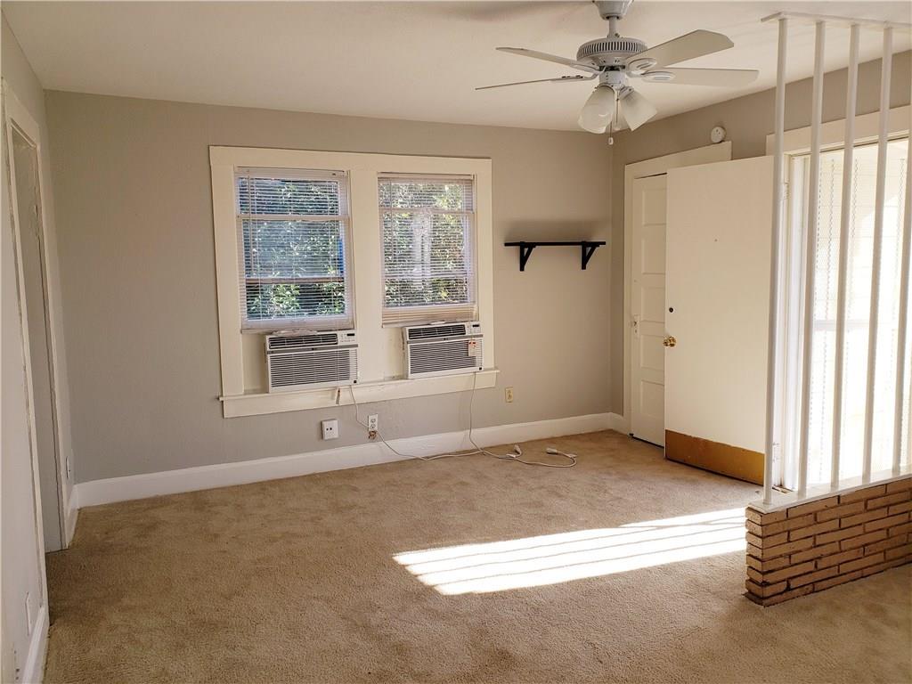 402 North Augusta Street Dallas, TX 75214 - Photo 4 of 11 a view of an empty room with a window