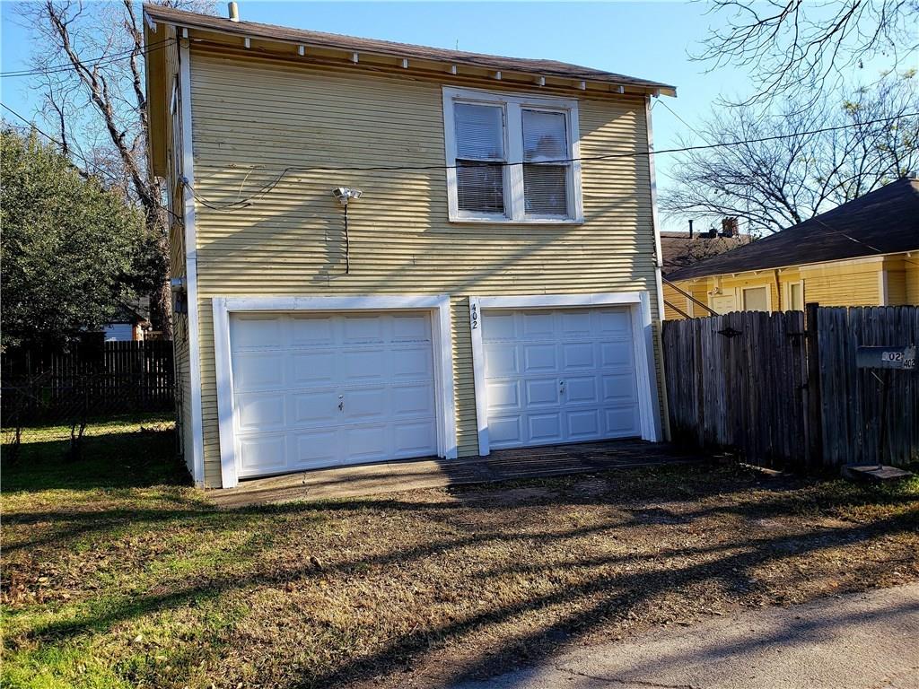 402 North Augusta Street Dallas, TX 75214 - Photo 10 of 11 a view of a house with a yard
