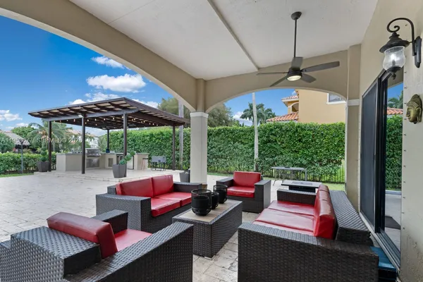 a outdoor living space with furniture and garden view