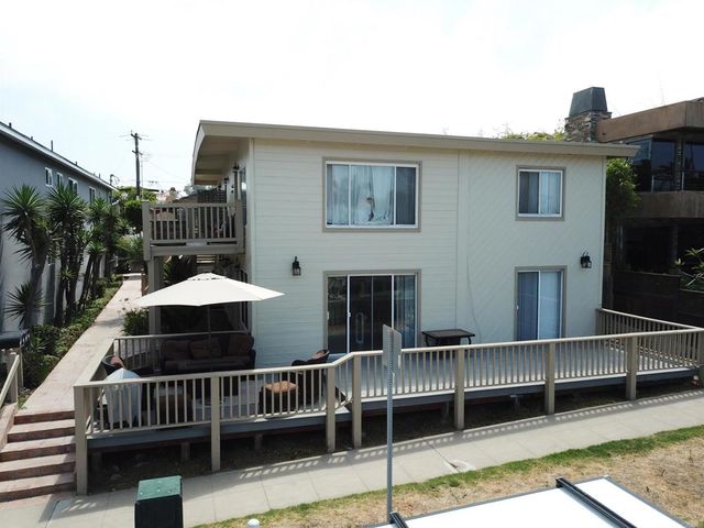 a front view of a house with balcony