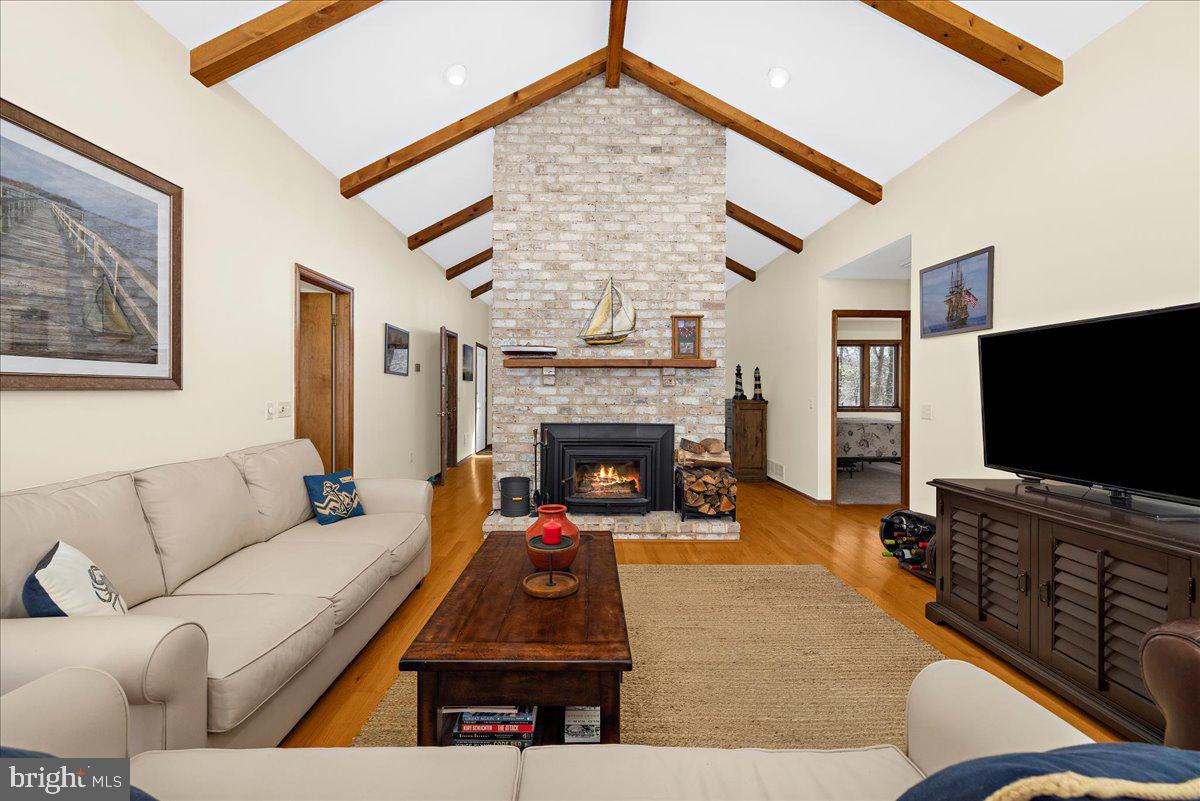 12440 Woods Road Worton, MD 21678 - Photo 11 of 37 a living room with furniture and a flat screen tv