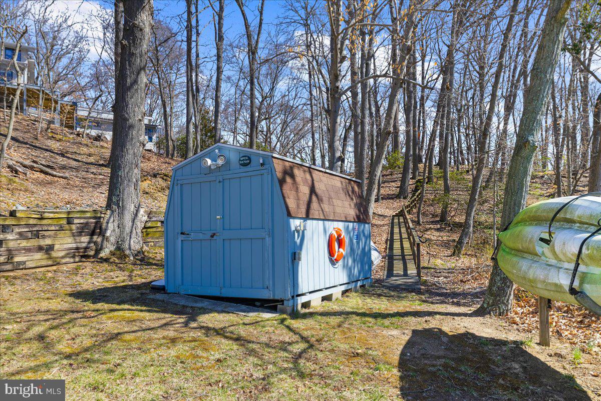 12440 Woods Road Worton, MD 21678 - Photo 28 of 37 a view of outdoor space and car parked
