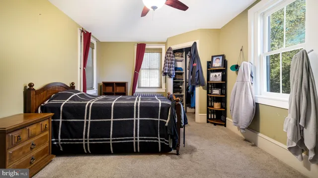 a view of a livingroom with furniture and window