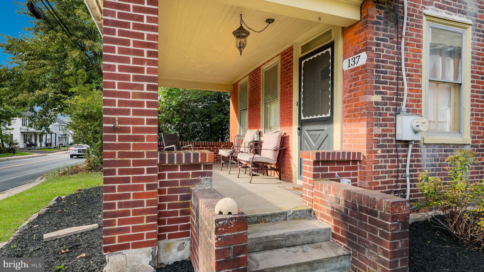 137 South Main Street Dublin, PA 18917 - Photo 5 of 29 a front view of a building with garden