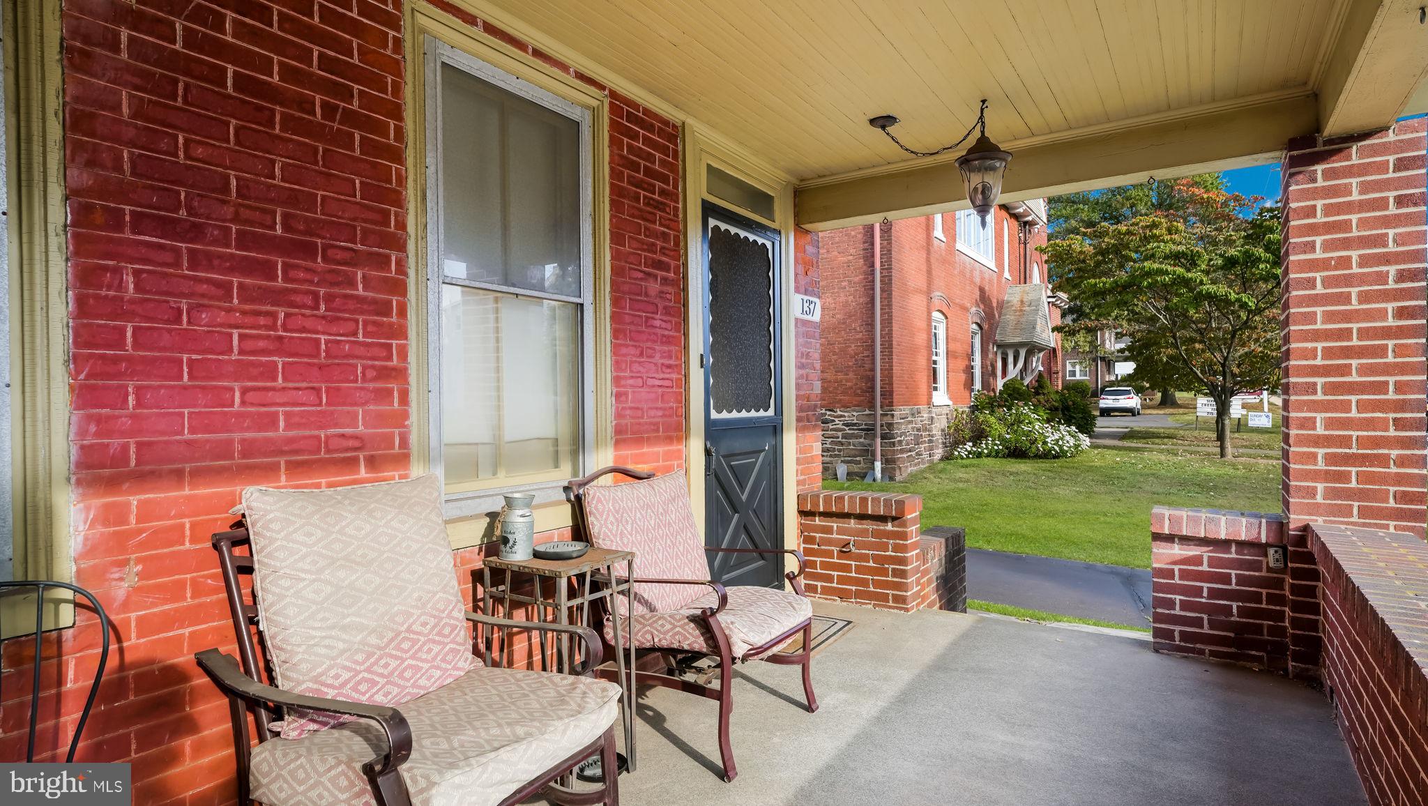 137 South Main Street Dublin, PA 18917 - Photo 6 of 29 a view of a patio with a dining table and chairs with the garden view