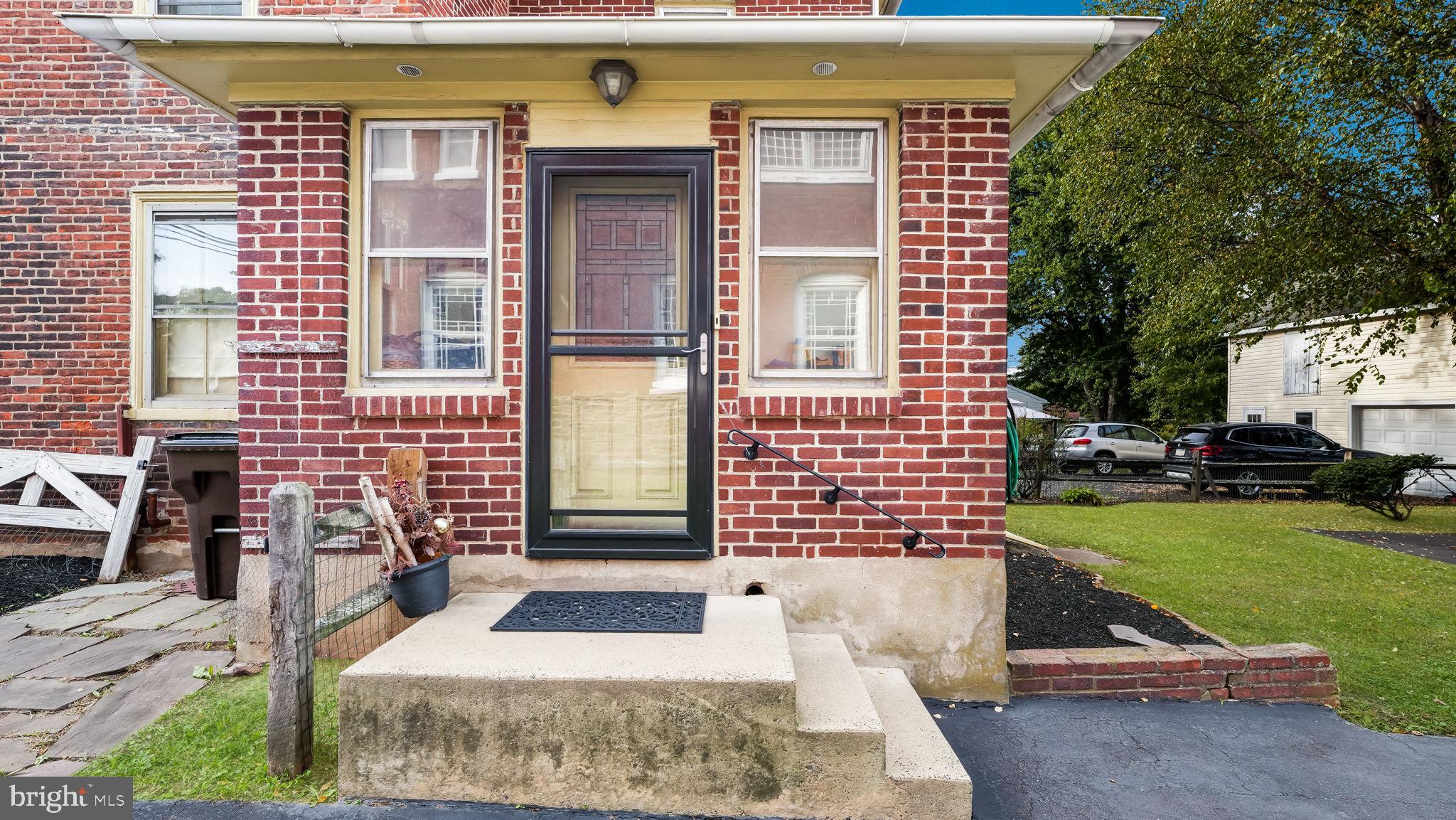 137 South Main Street Dublin, PA 18917 - Photo 7 of 29 a front view of a house with a garden