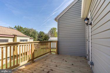 2700 East Joppa Road Baltimore, MD 21234 - Photo 43 of 52 rear wood deck leading to back door in kitchen