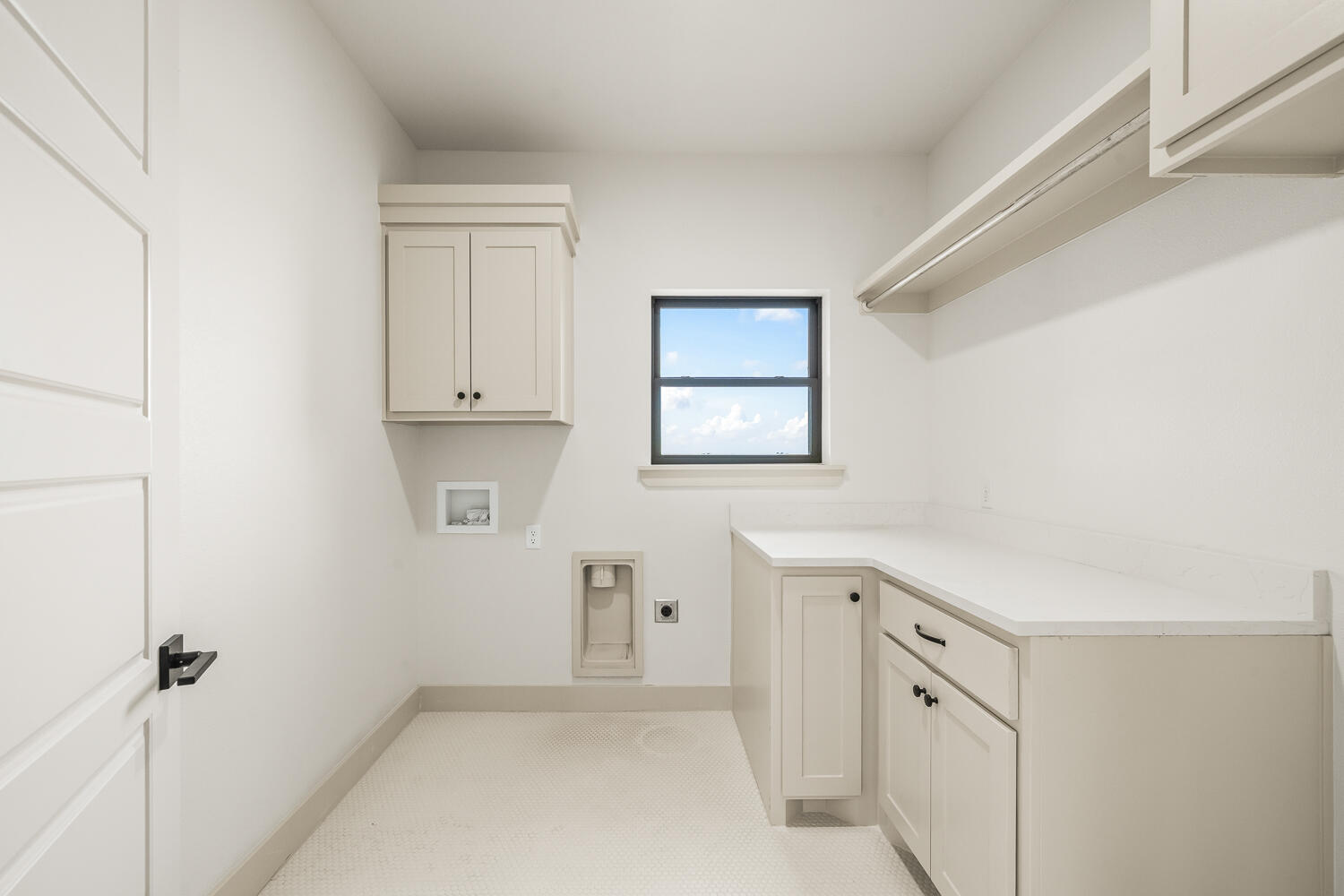 5603 County Road 6100 Lubbock, TX 79415 - Photo 16 of 46 a view of a bathroom with white cabinets