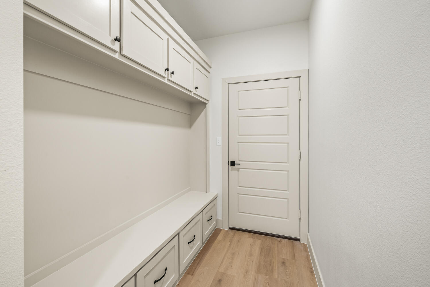 5603 County Road 6100 Lubbock, TX 79415 - Photo 18 of 46 a view of walk in closet with wooden floor