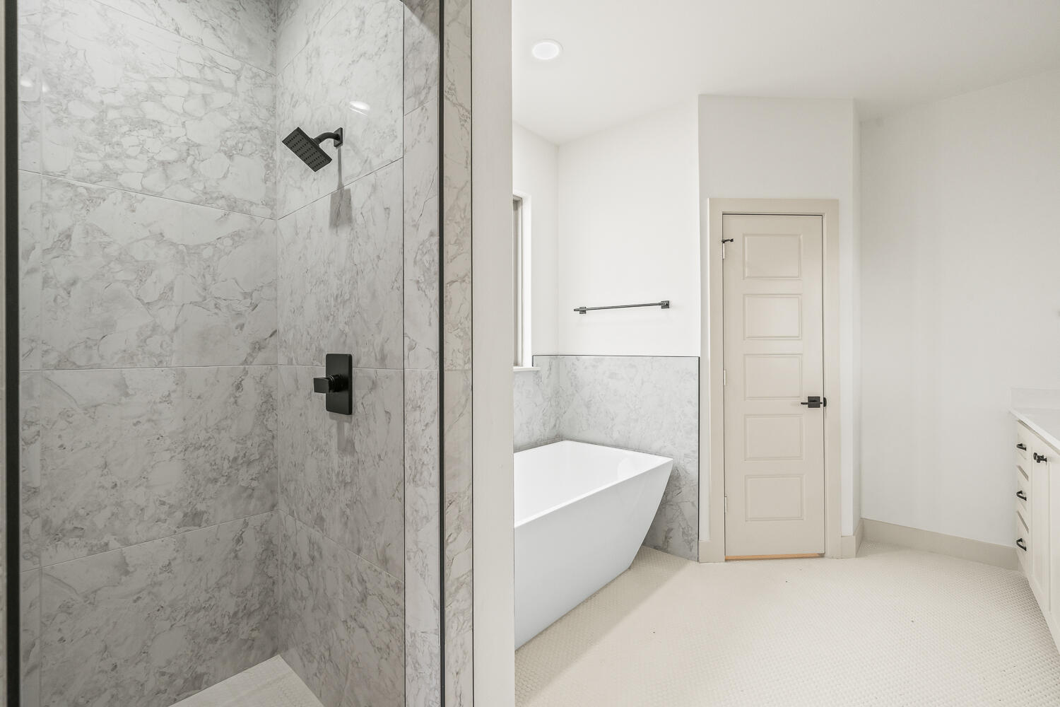 5603 County Road 6100 Lubbock, TX 79415 - Photo 23 of 46 a bathroom with a tub and shower