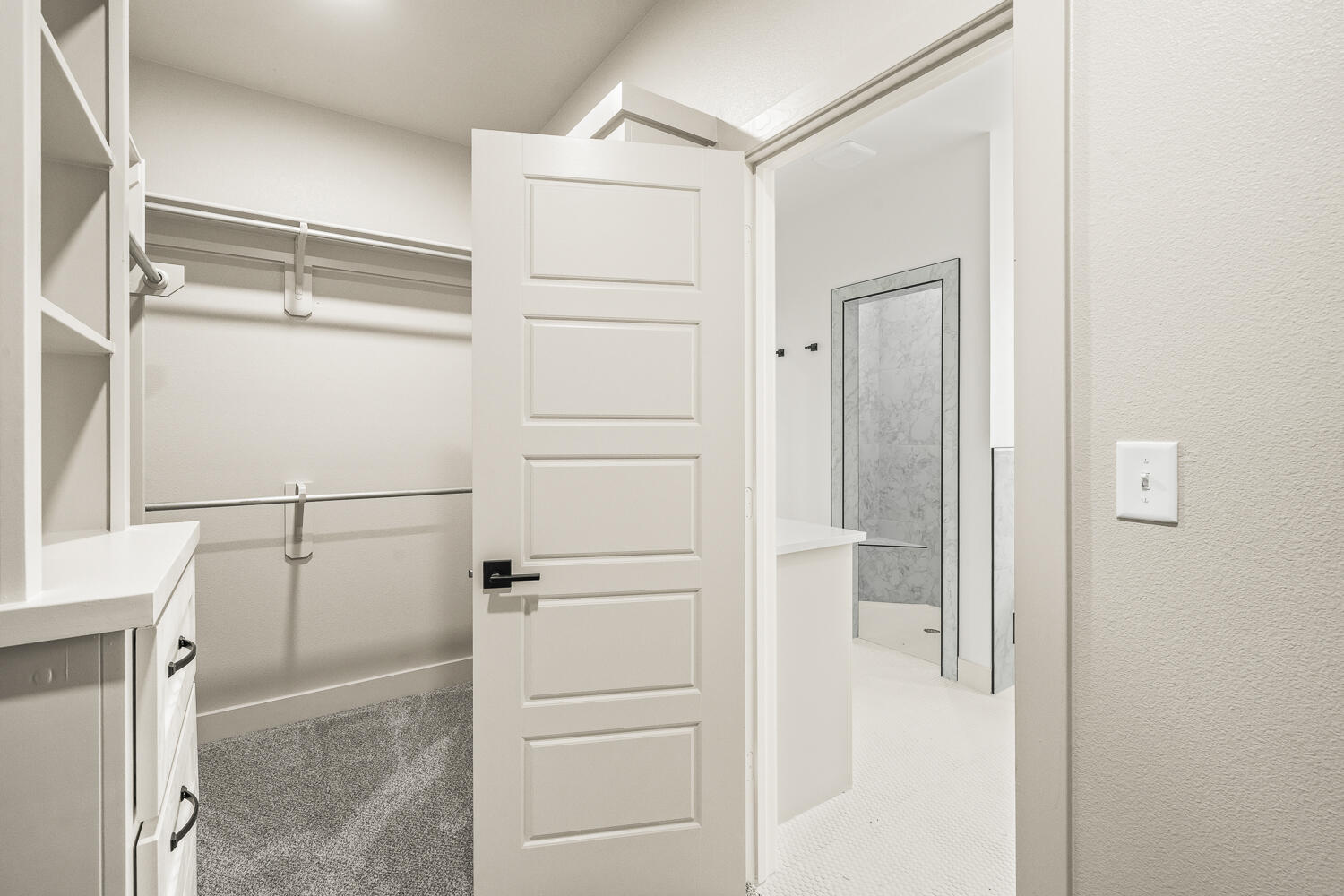 5603 County Road 6100 Lubbock, TX 79415 - Photo 27 of 46 a bathroom with a shower and a glass door