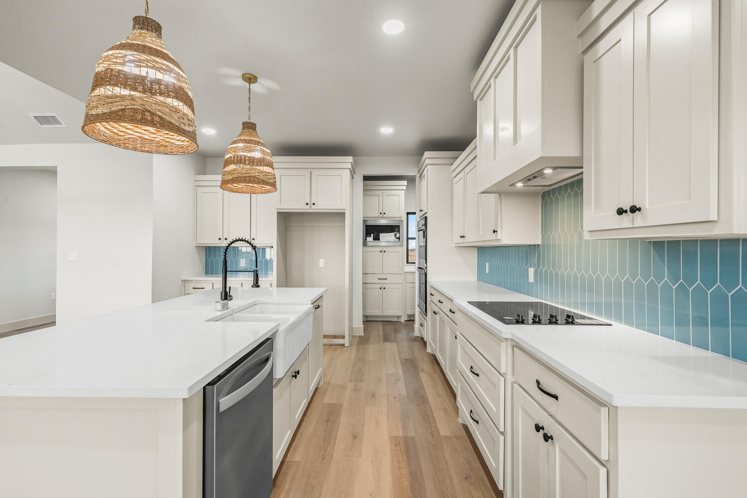 5603 County Road 6100 Lubbock, TX 79415 - Photo 30 of 46 a kitchen with stainless steel appliances a sink a stove a refrigerator and cabinets