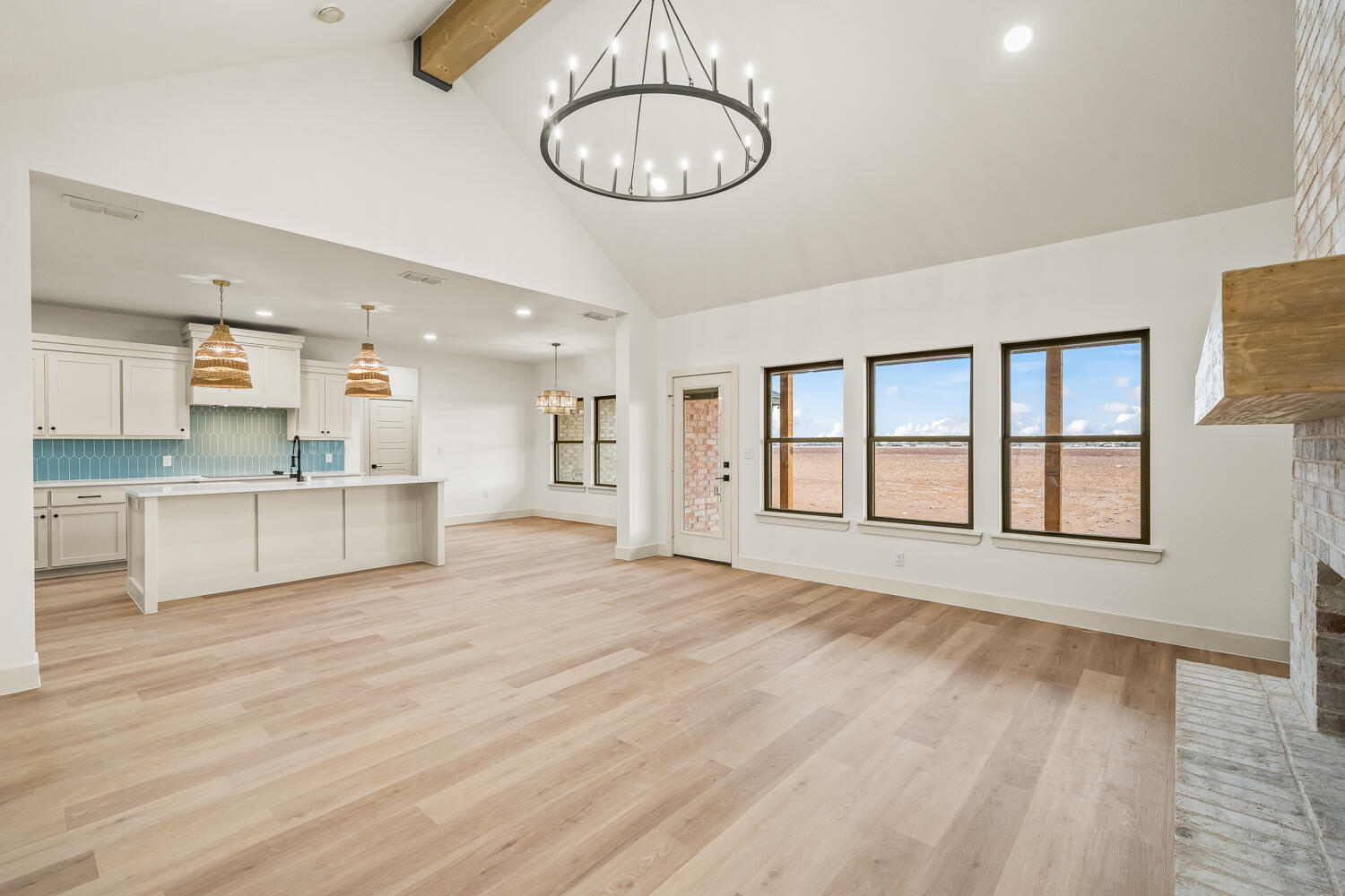 5603 County Road 6100 Lubbock, TX 79415 - Photo 40 of 46 a view of an empty room with kitchen and window