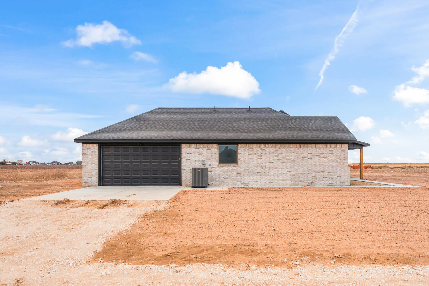 5603 County Road 6100 Lubbock, TX 79415 - Photo 43 of 46 a house view with a snow in the background