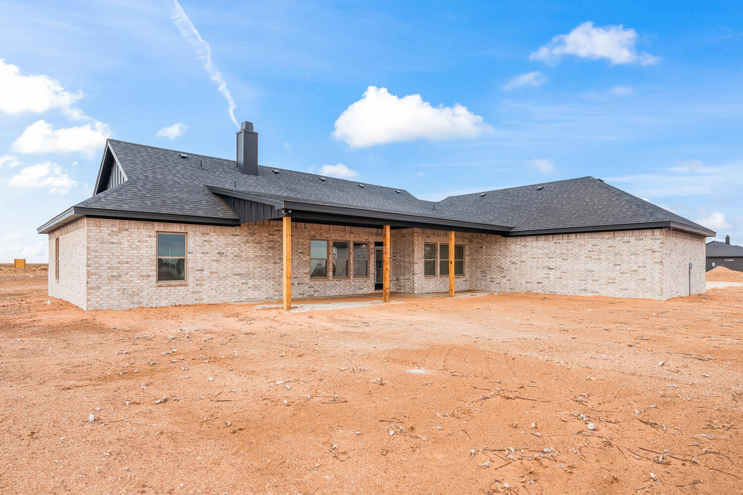 5603 County Road 6100 Lubbock, TX 79415 - Photo 46 of 46 a front view of a house with a yard and garage