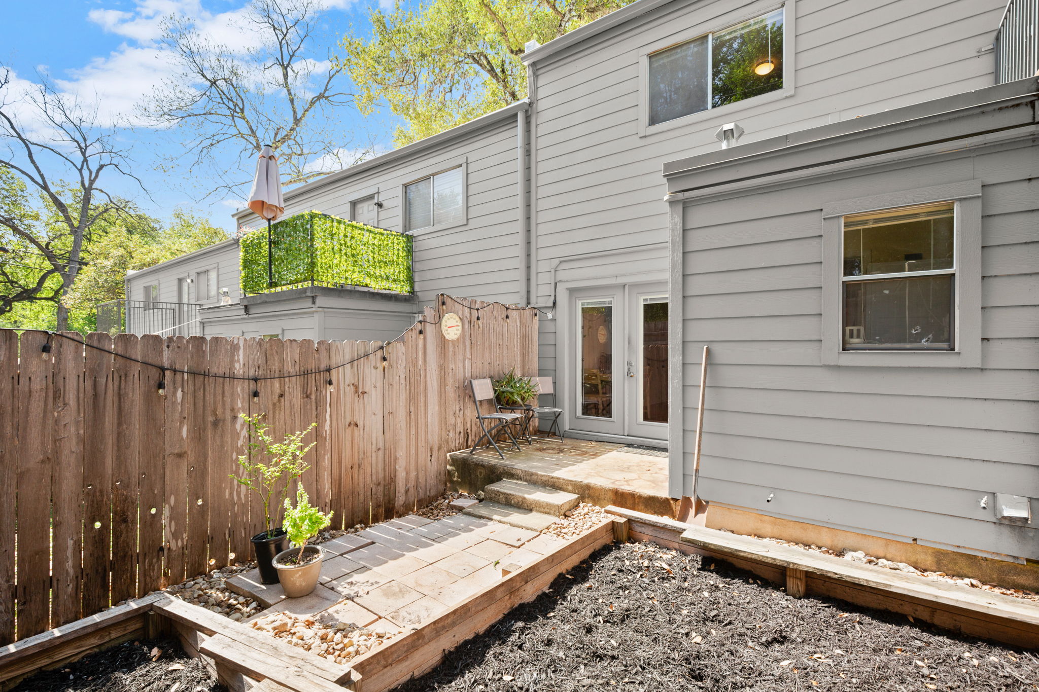 1912 Lightsey Road, Unit 2 Austin, TX 78704 - Photo 14 of 25 a view of house with backyard