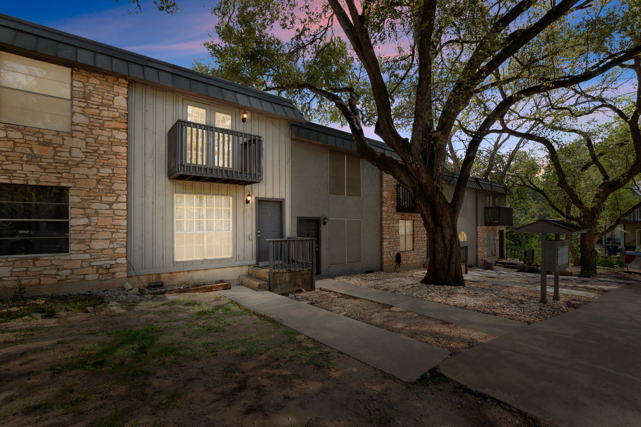 1912 Lightsey Road, Unit 2 Austin, TX 78704 - Photo 23 of 25 a front view of a house with garden