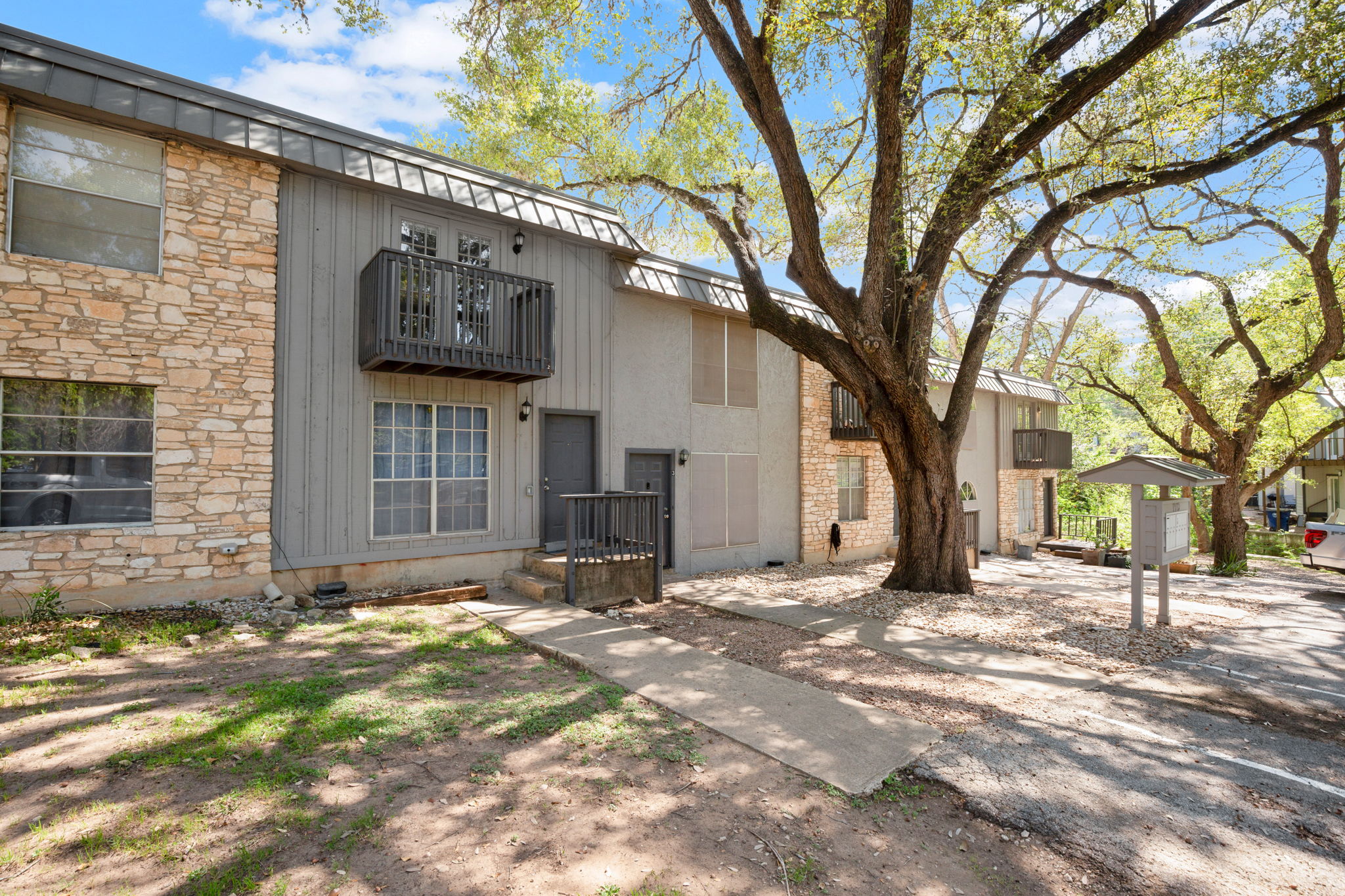 1912 Lightsey Road, Unit 2 Austin, TX 78704 - Photo 2 of 25 a view of a house with a snow in the yard