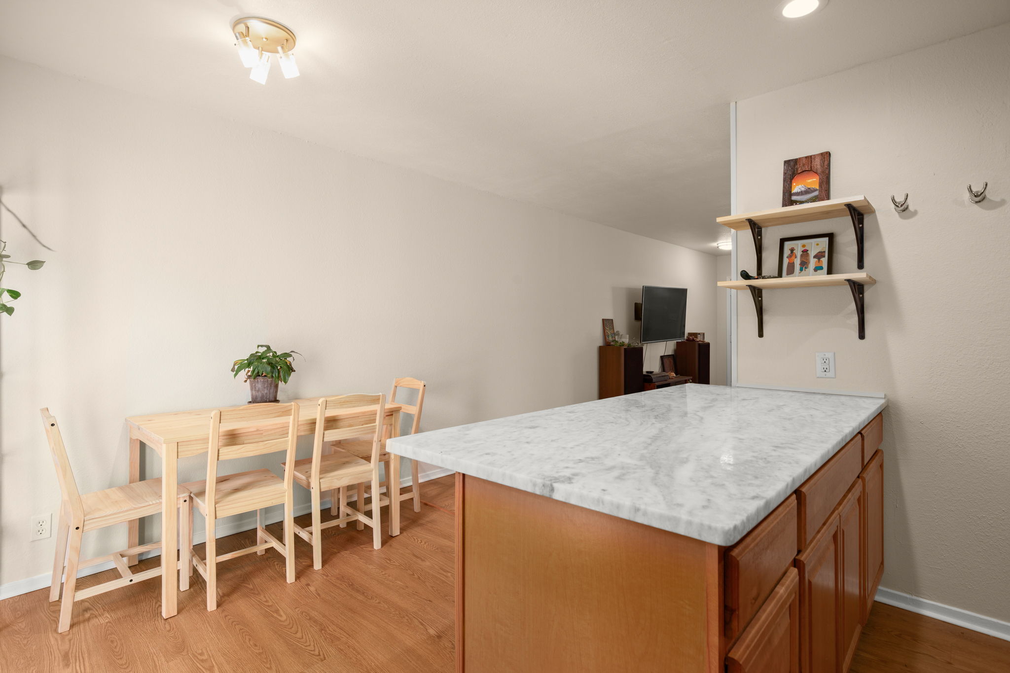 1912 Lightsey Road, Unit 2 Austin, TX 78704 - Photo 5 of 25 a kitchen with a table and chairs in it