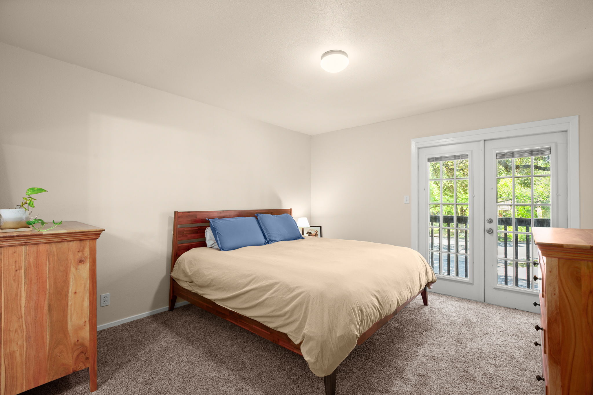 1912 Lightsey Road, Unit 2 Austin, TX 78704 - Photo 6 of 25 a bedroom with a bed and a window